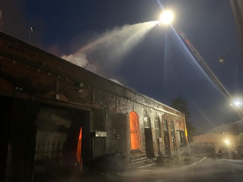 Commercial building in Oldham on fire