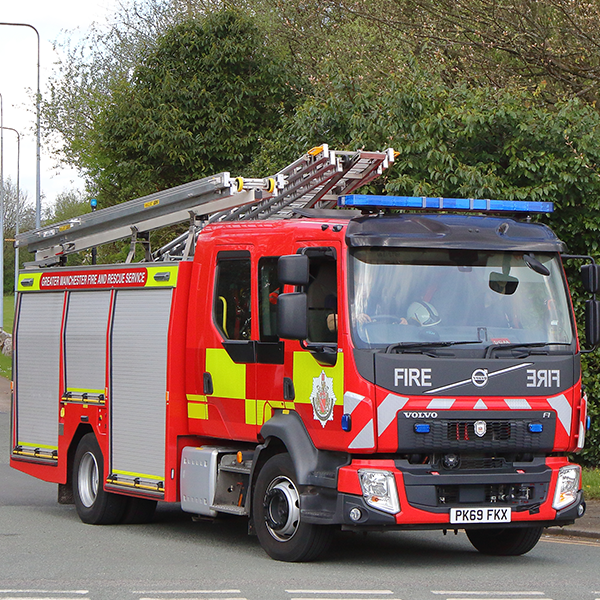 Fire engine with trees behind