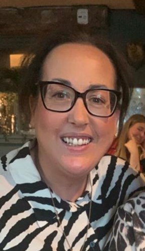 Paula Allen smiling at camera